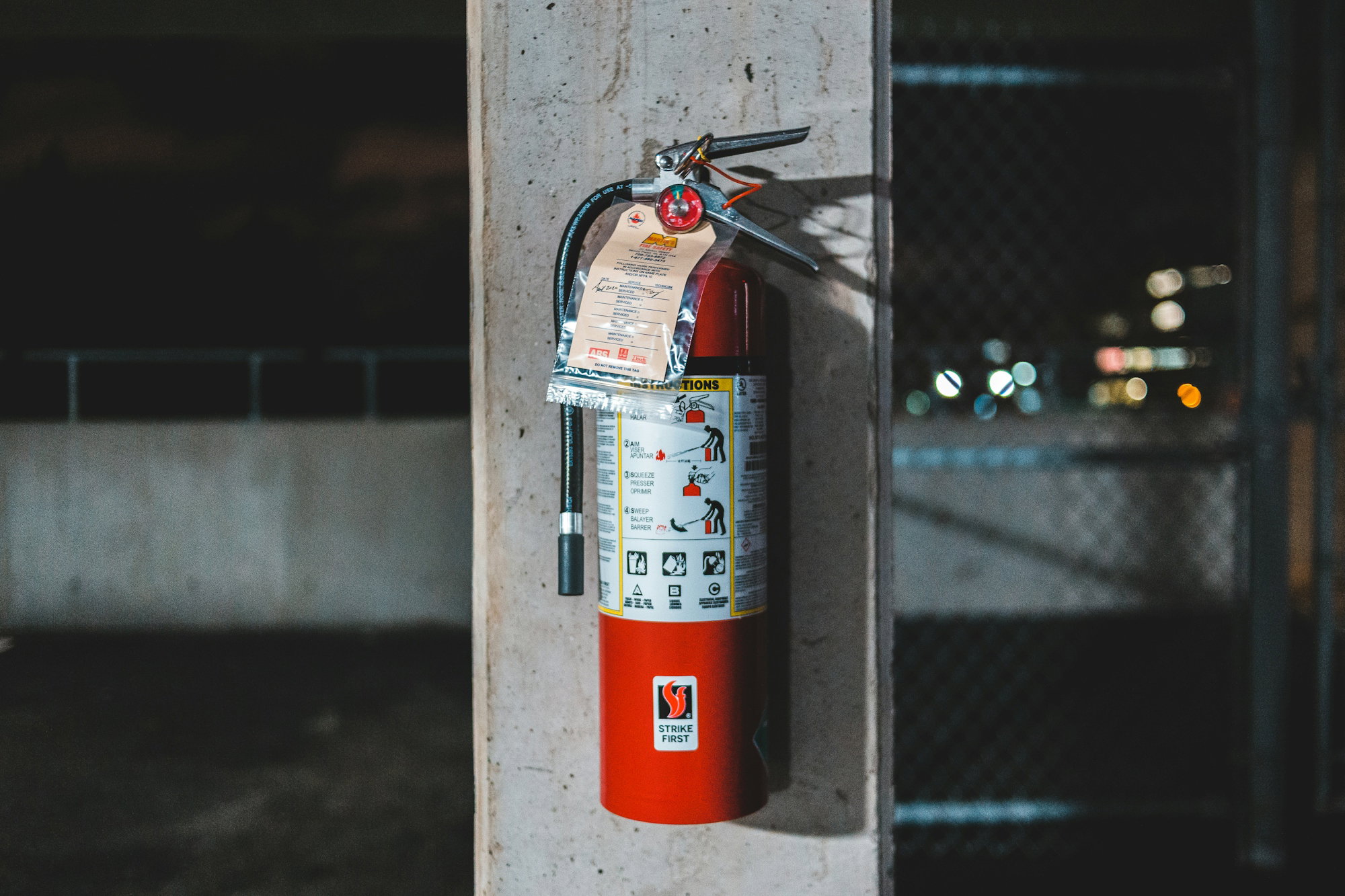 red-fire-extinguisher-mounted-on-wall.jpg red fire extinguisher mounted on wall